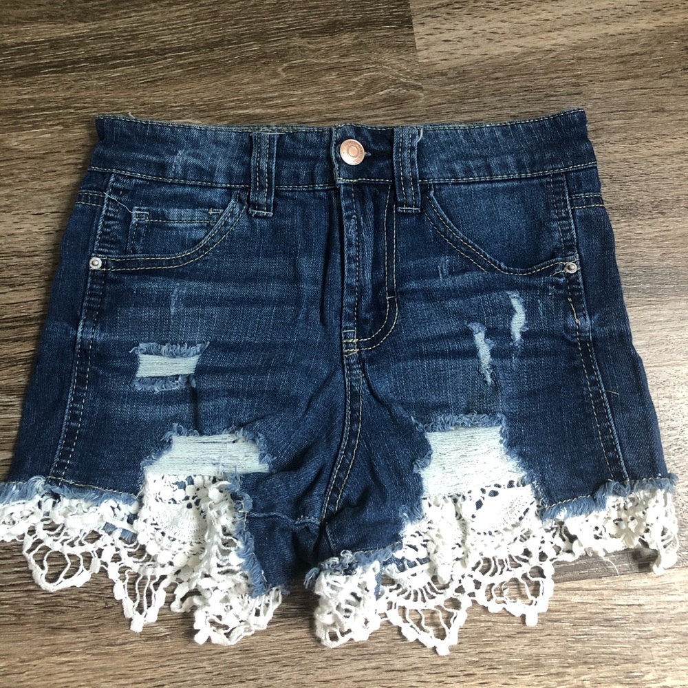 distressed denim shorts with white lace